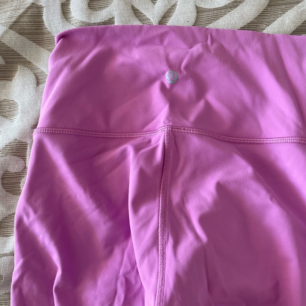 Lululemon pink align tight size 4, worn once, excellent condition. 28”